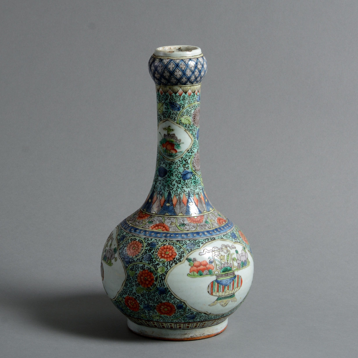 A 19th century qing dynasty famille verte bottle vase