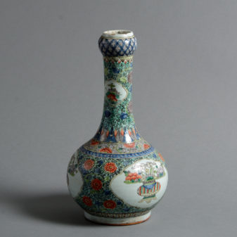 A 19th century qing dynasty famille verte bottle vase