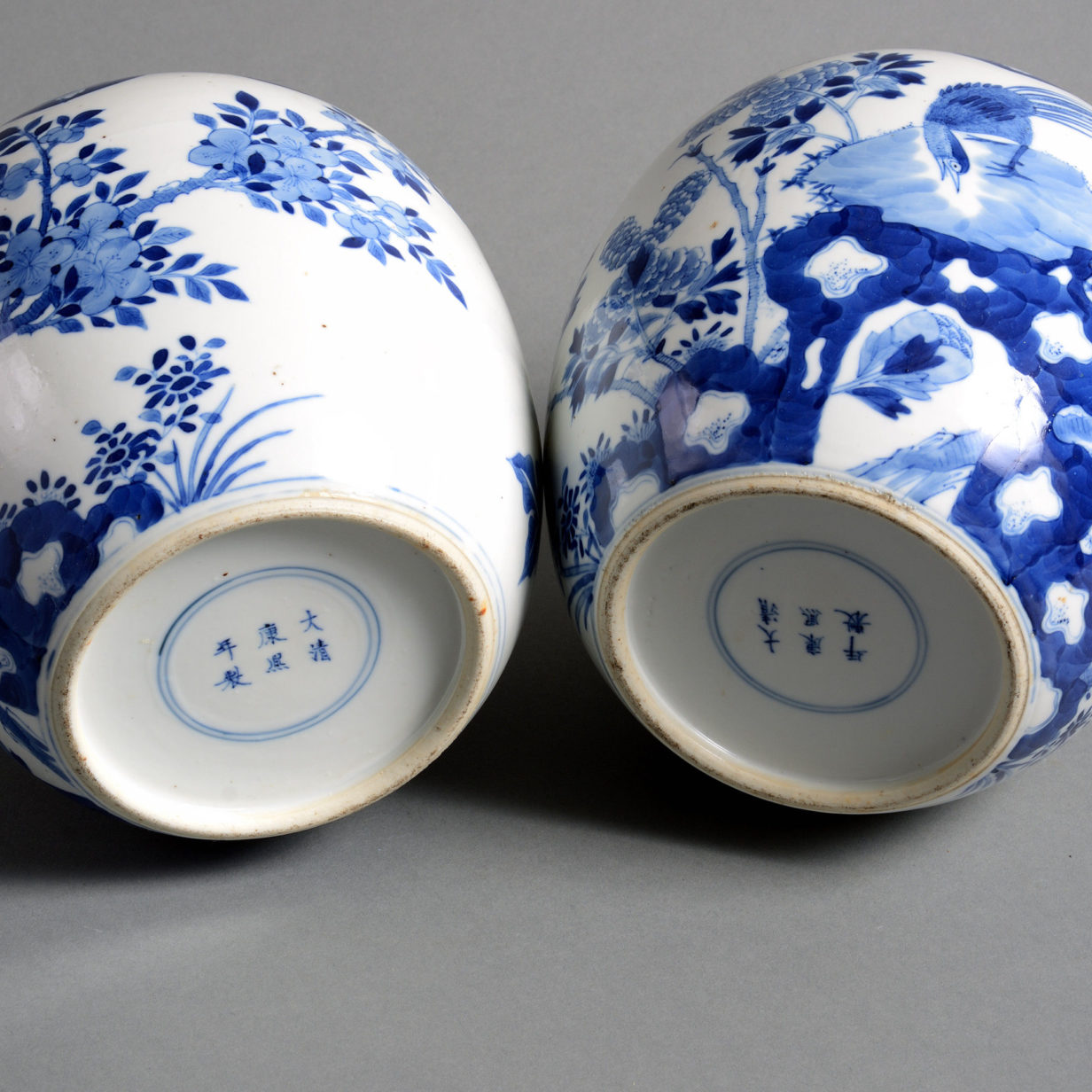 A pair of 19th century qing dynasty blue & white porcelain vases