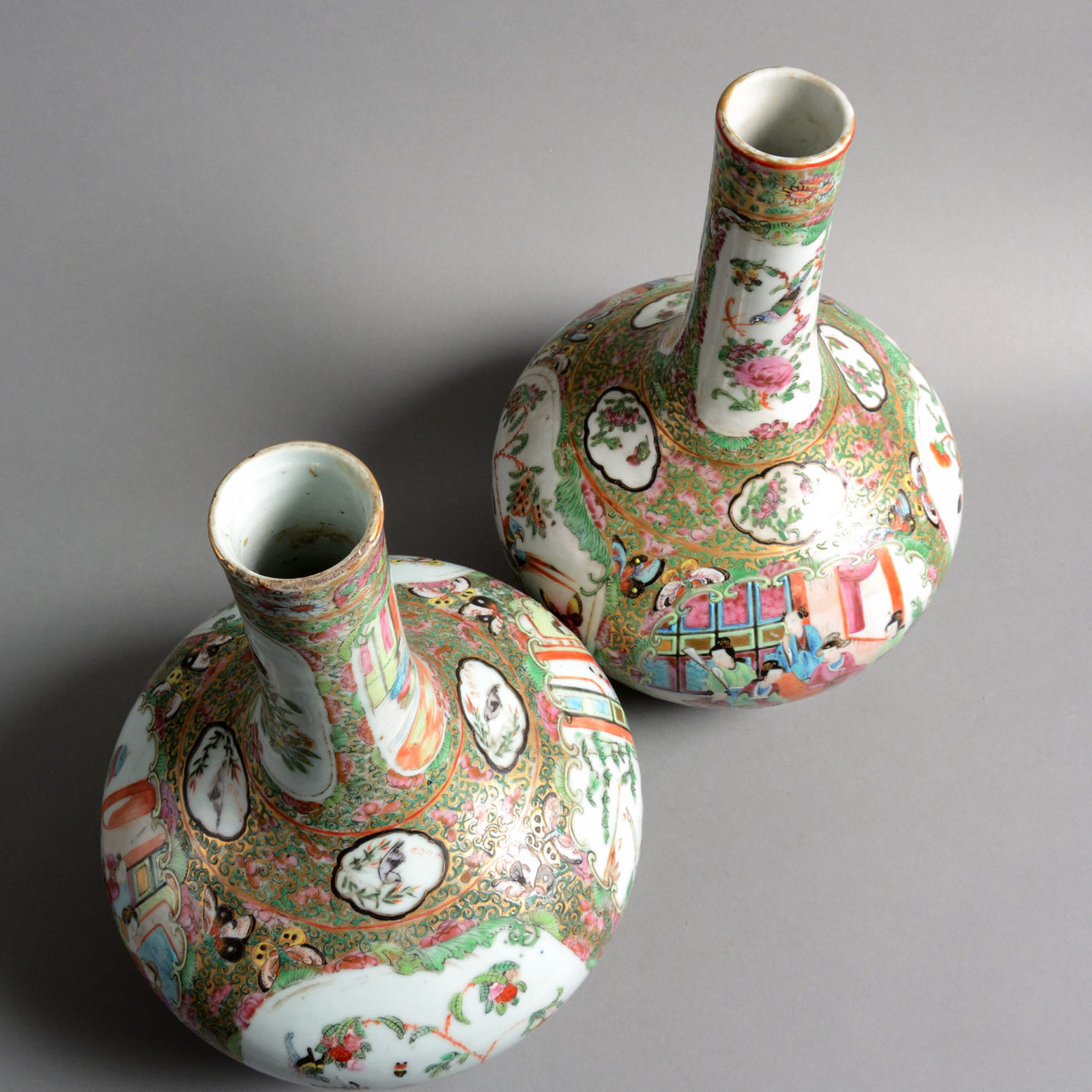 A pair of 19th century qing dynasty canton porcelain bottle vases