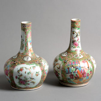A pair of 19th century qing dynasty canton porcelain bottle vases