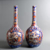 A tall pair of 19th century imari bottle vases