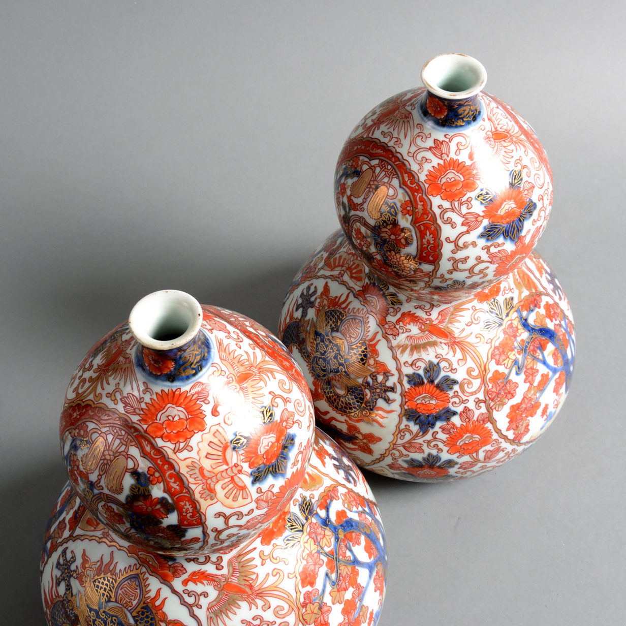 A pair of 19th century imari porcelain double gourd form vases