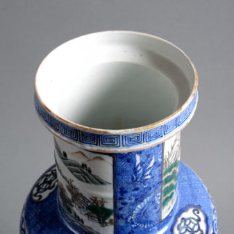 A 19th century qing dynasty famille verte blue ground porcelain vase