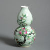 An early 20th century celadon gourd vase