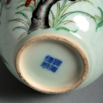 An early 20th century celadon gourd vase