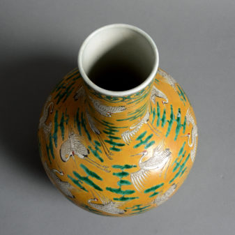 A 19th century qing dynasty yellow ground bottle vase