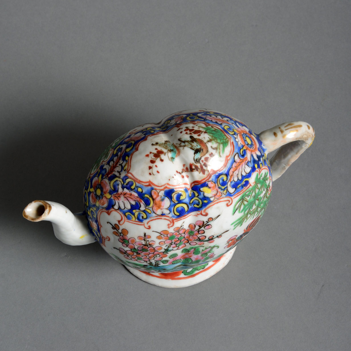 A 19th century famille rose cadogan tea pot