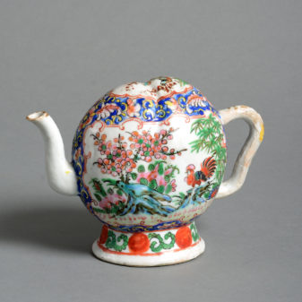 A 19th century famille rose cadogan tea pot