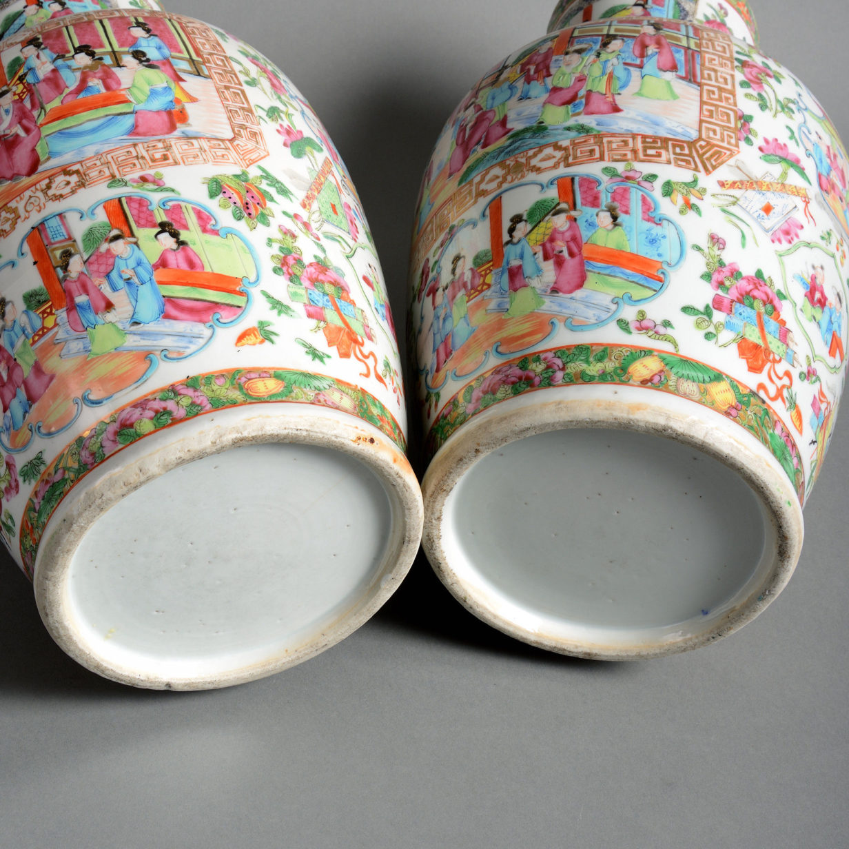 A 19th century pair of chinese canton vases and covers