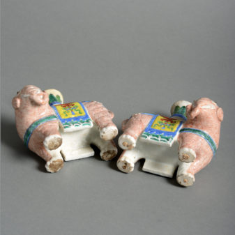 A pair of 19th century porcelain elephant incense stick holders