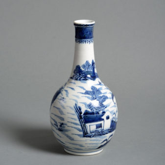 An 18th century blue and white glazed bottle vase