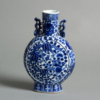 A 19th century blue and white porcelain moon flask