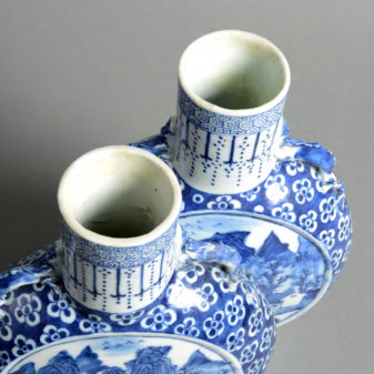 A pair of 19th century blue & white porcelain moon flasks