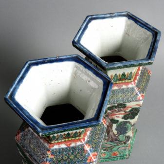 A 19th century pair of famille verte porcelain vases