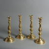 A Set of Four 19th Century Large Brass Candlesticks
