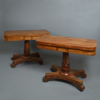 A 19th pair of regency period mahogany card tables