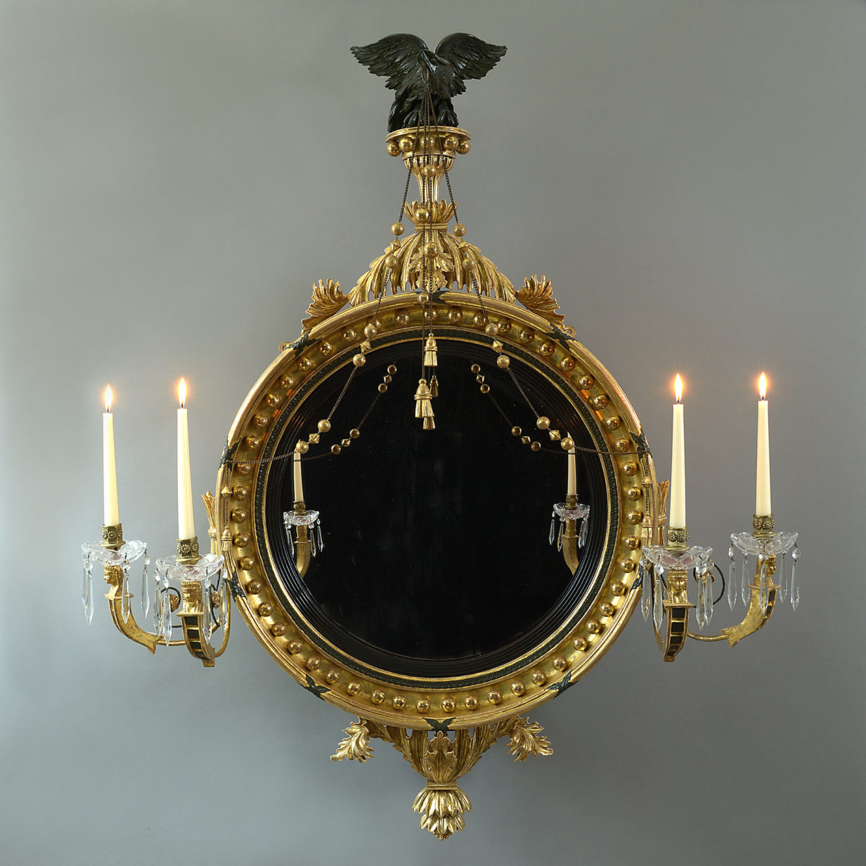 An important 19th century regency period convex mirror by fentham of london