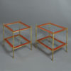 A mid-20th century pair of mallett red lacquer two tier tables