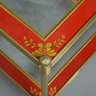 A mid-20th century pair of mallett red lacquer two tier tables