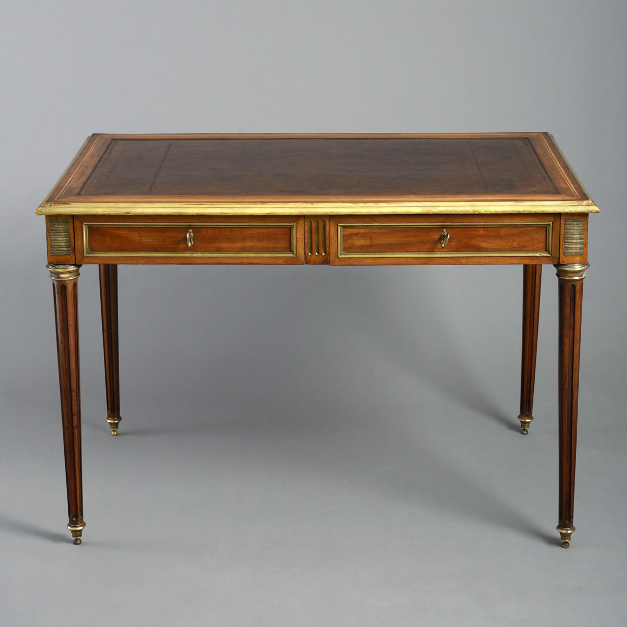 A late 19th century louis xvi style writing table