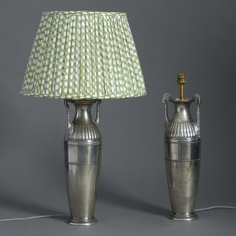 A Pair of Silvered Table Lamps