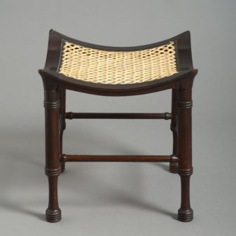 An Early 20th Century Ebonised Thebes Stool