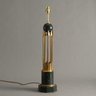 A mid-century empire style arrow lamp base