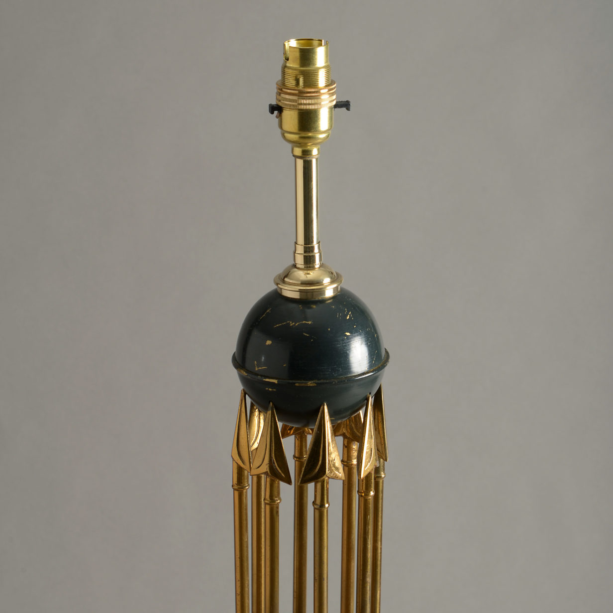 A mid-century empire style arrow lamp base