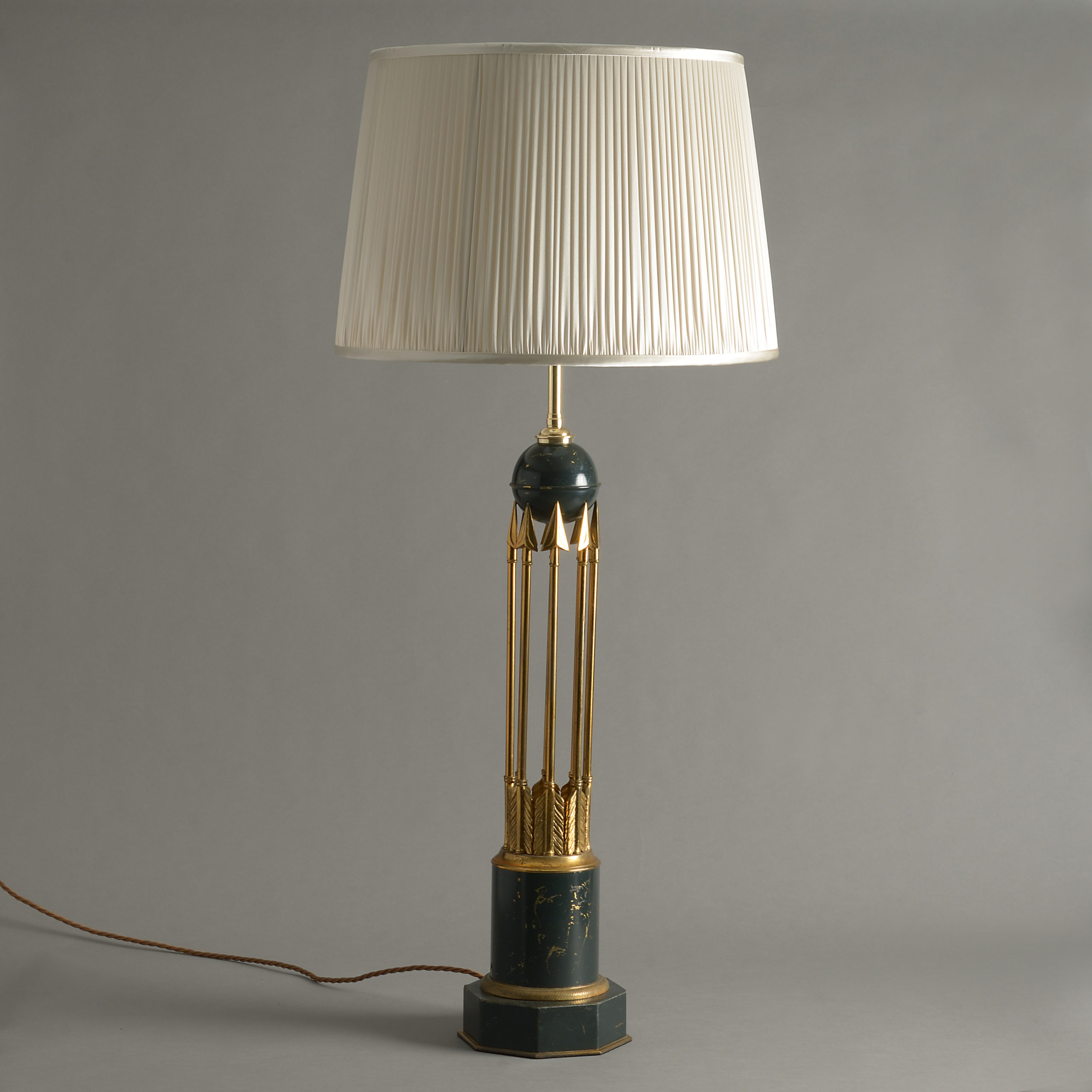 A Mid-Century Empire Style Arrow Lamp 