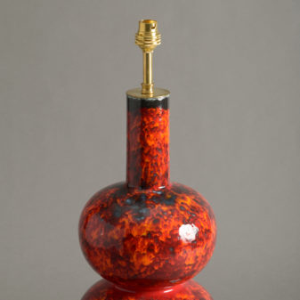 A red studio pottery vase lamp