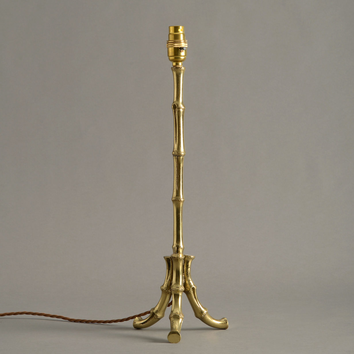 A mid-century gilt brass faux bamboo lamp