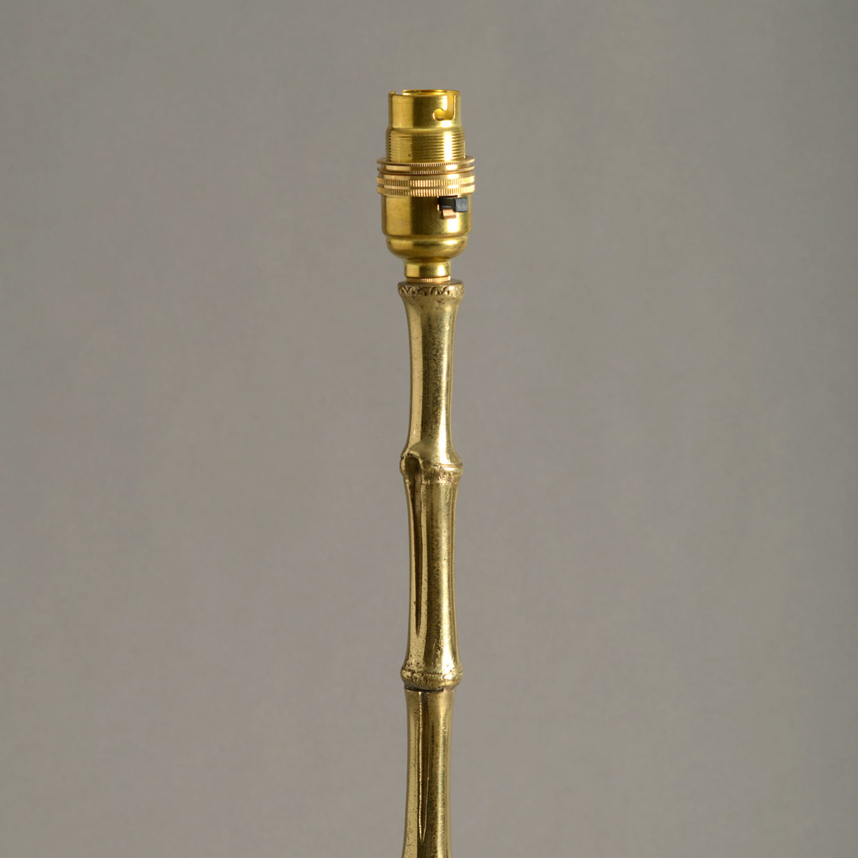 A mid-century gilt brass faux bamboo lamp