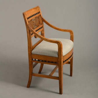 A late 18th century directoire period elm open armchair