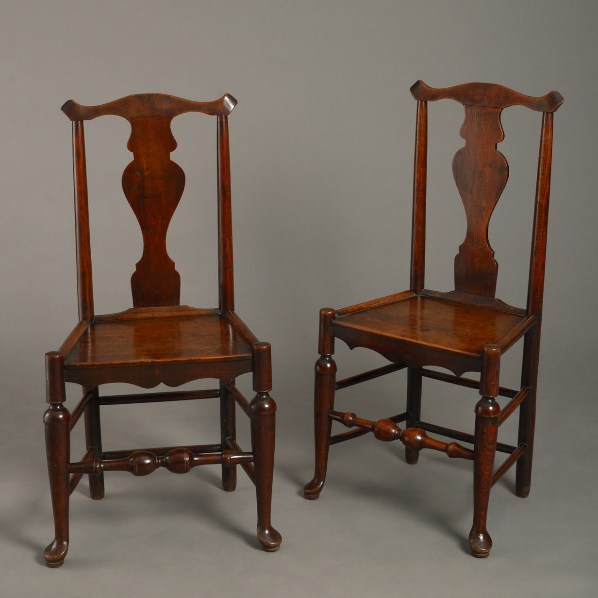 Four mid-18th century shropshire elm side chairs