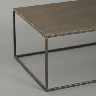 A mid-century modernist steel low table