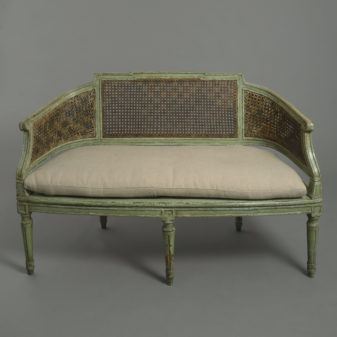 An 18th century painted canapé sofa