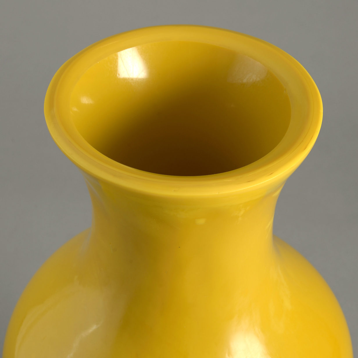 A tall 19th century yellow peking glass vase