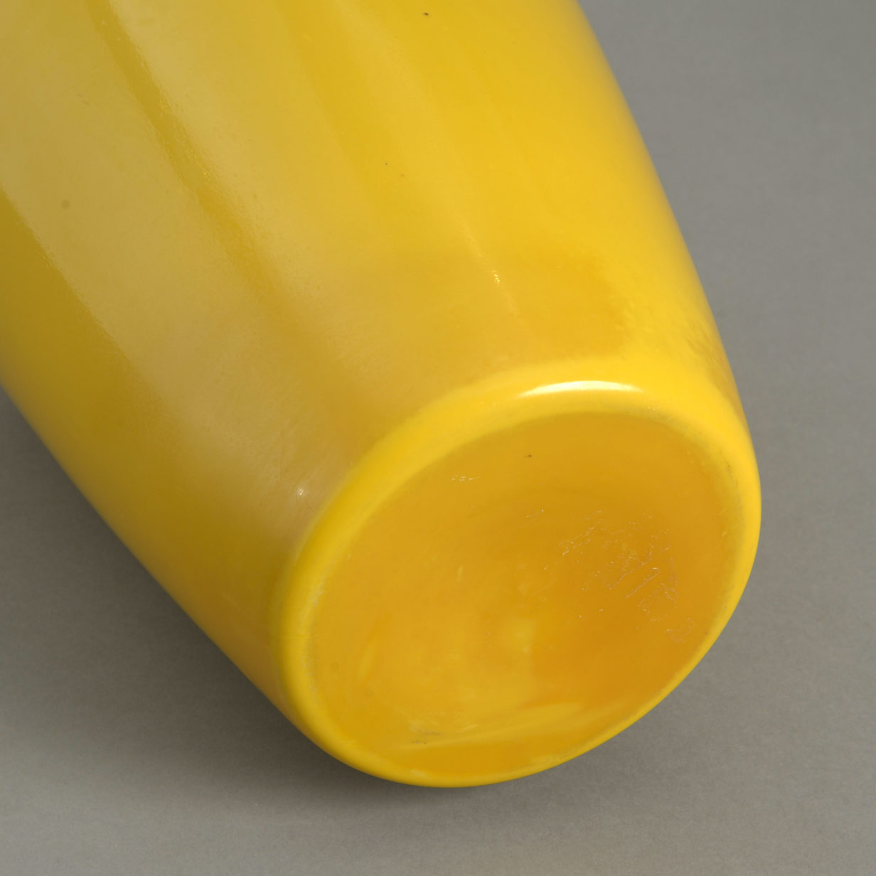 A tall 19th century yellow peking glass vase