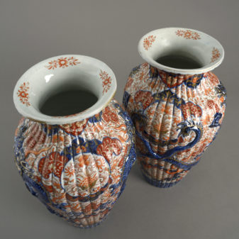A pair of 19th century imari dragon vases