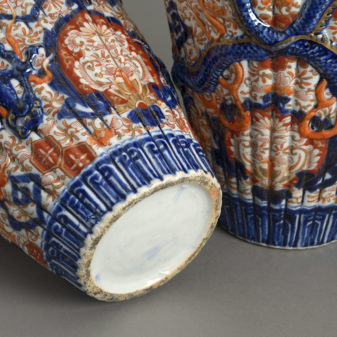 A pair of 19th century imari dragon vases