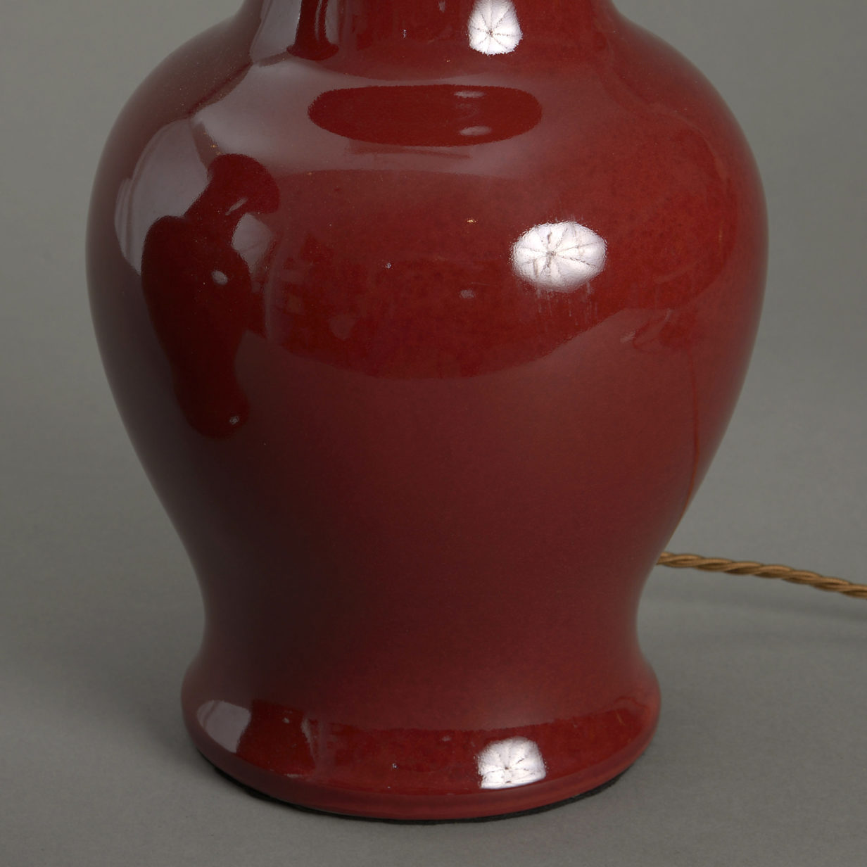 Pair of trumpet neck red vases