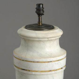 A pair of white marble vase lamps