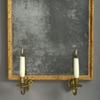 An 18th century george i period gilt gesso girandole mirror
