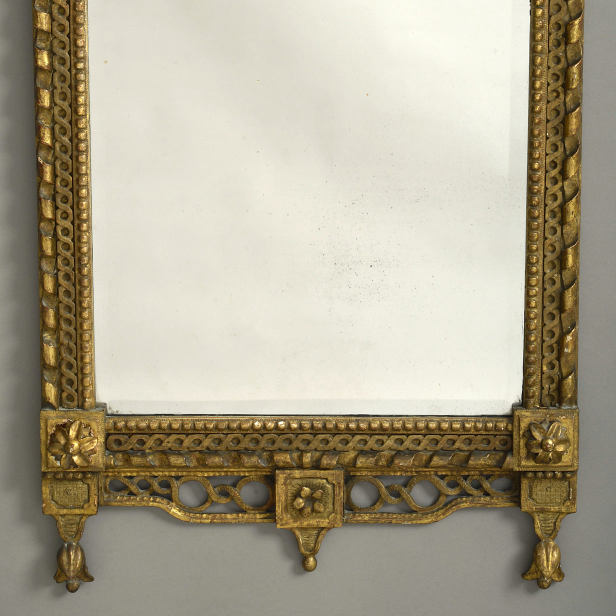 An 18th century giltwood pier mirror