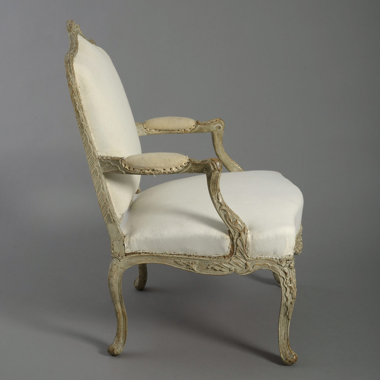 An 18th century painted rococo open armchair