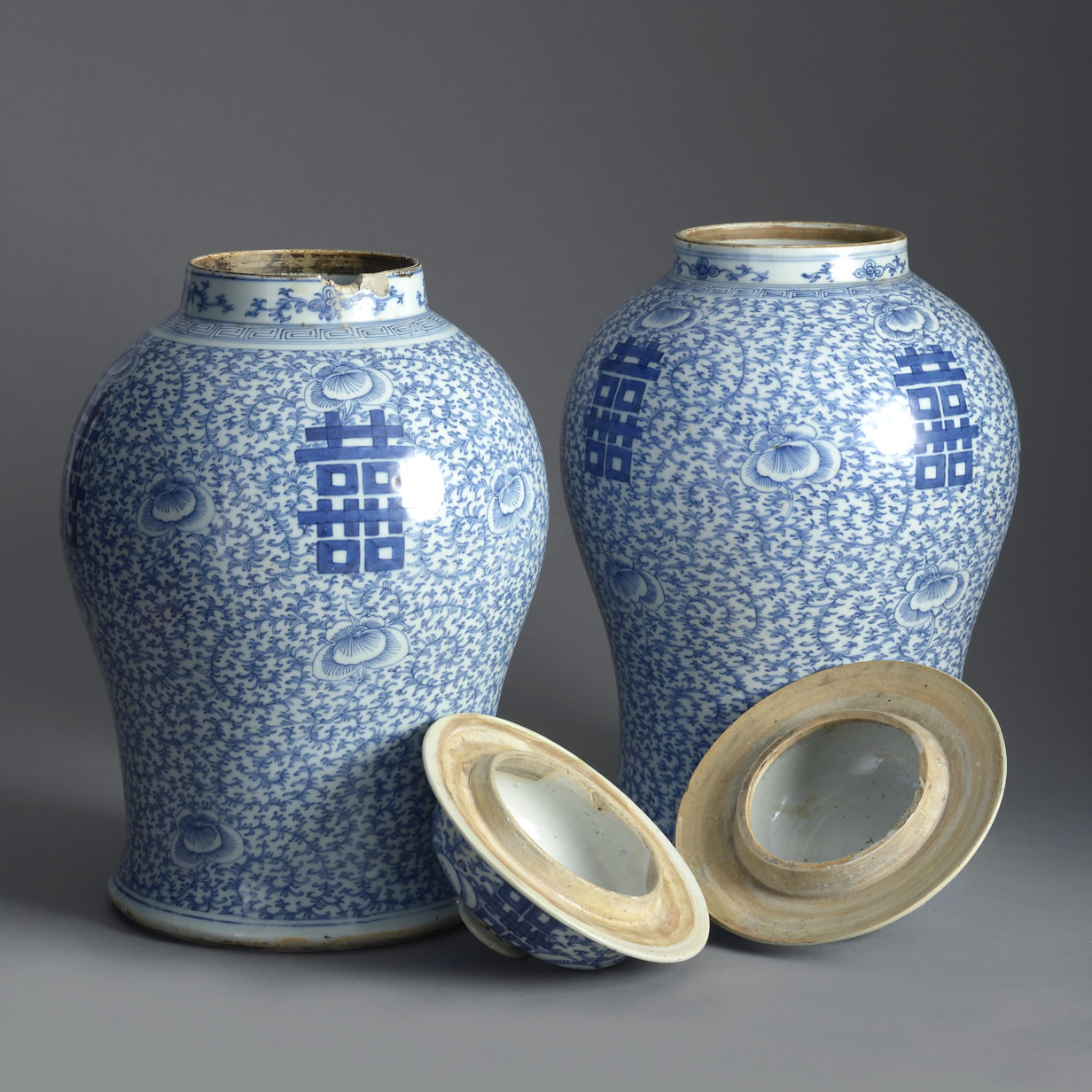 19th century pair of blue and white porcelain vases and covers