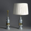 Pair of chrome and brass lamps