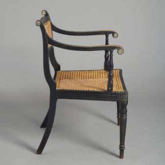 Early 19th century regency period ebonised armchair