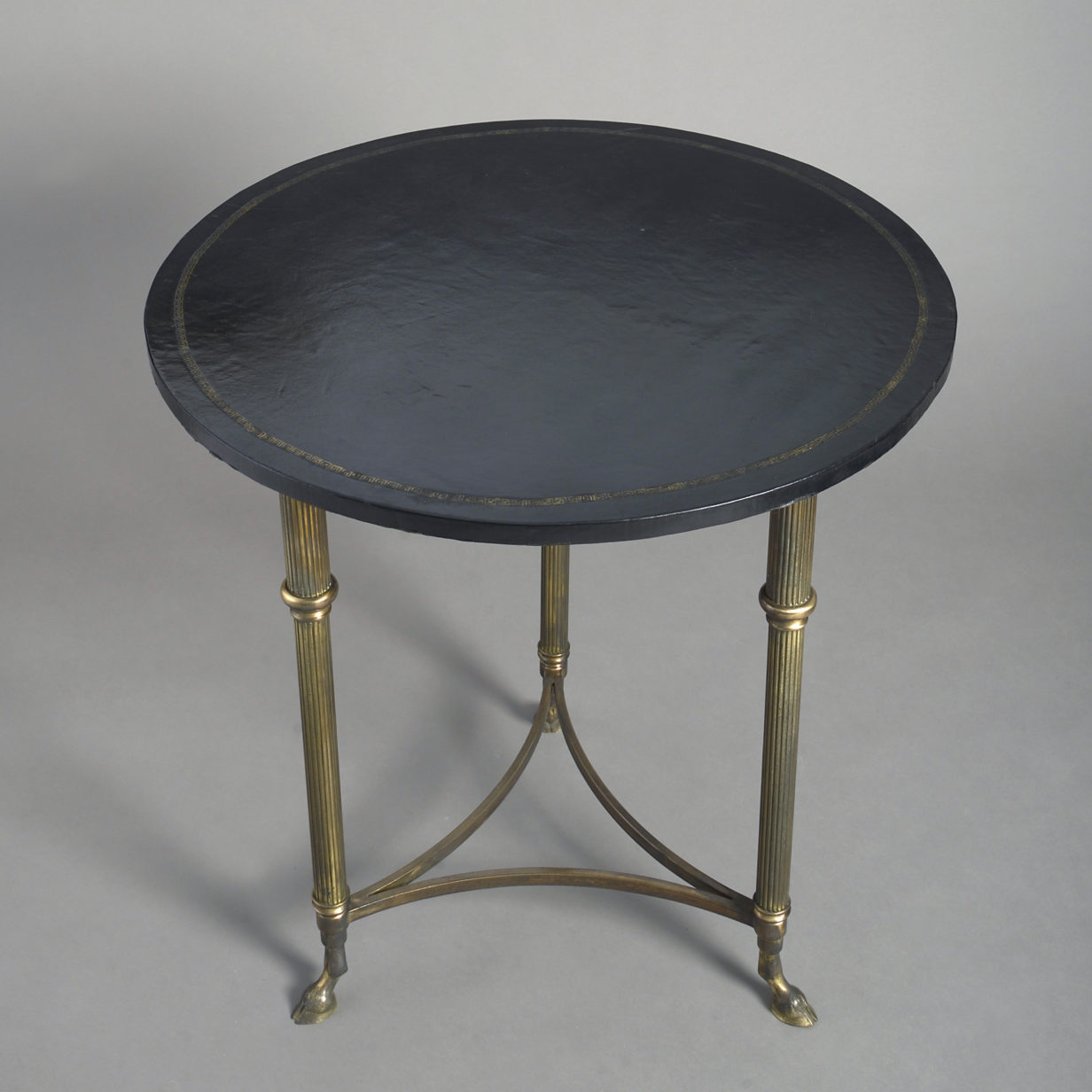 Mid-century leather topped occasional table